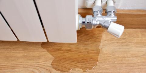 fuite d'eau sous un radiateur